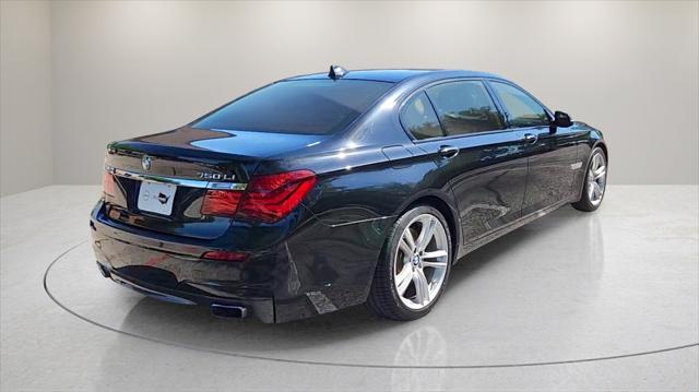 used 2015 BMW 750 car, priced at $16,995