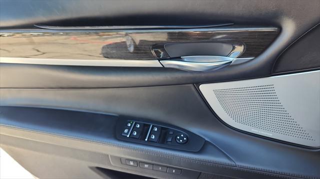 used 2015 BMW 750 car, priced at $16,995