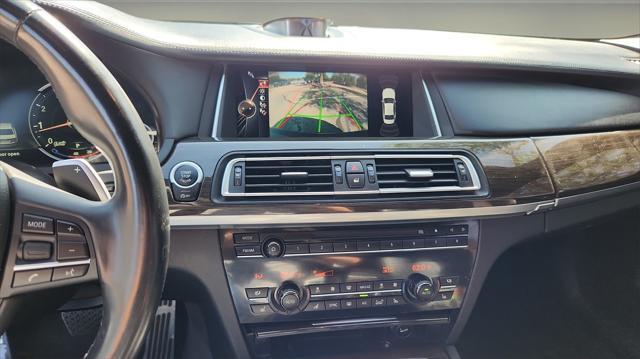 used 2015 BMW 750 car, priced at $16,995