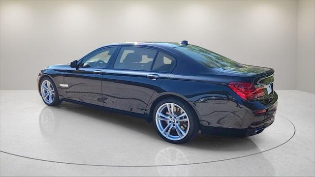 used 2015 BMW 750 car, priced at $16,995