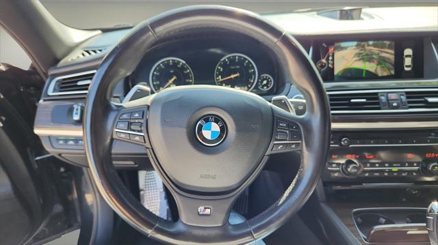 used 2015 BMW 750 car, priced at $16,995