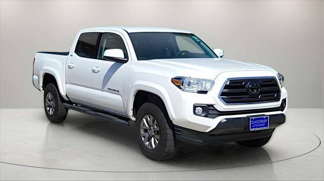 used 2019 Toyota Tacoma car, priced at $27,653