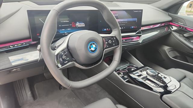 used 2024 BMW i5 car, priced at $47,971