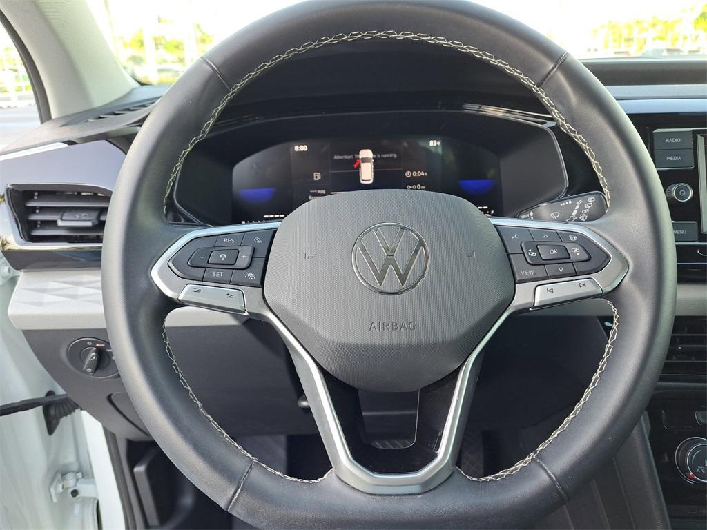 used 2023 Volkswagen Taos car, priced at $18,377