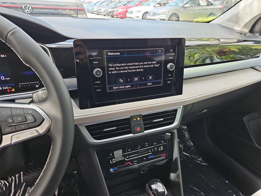 new 2025 Volkswagen Taos car, priced at $28,991