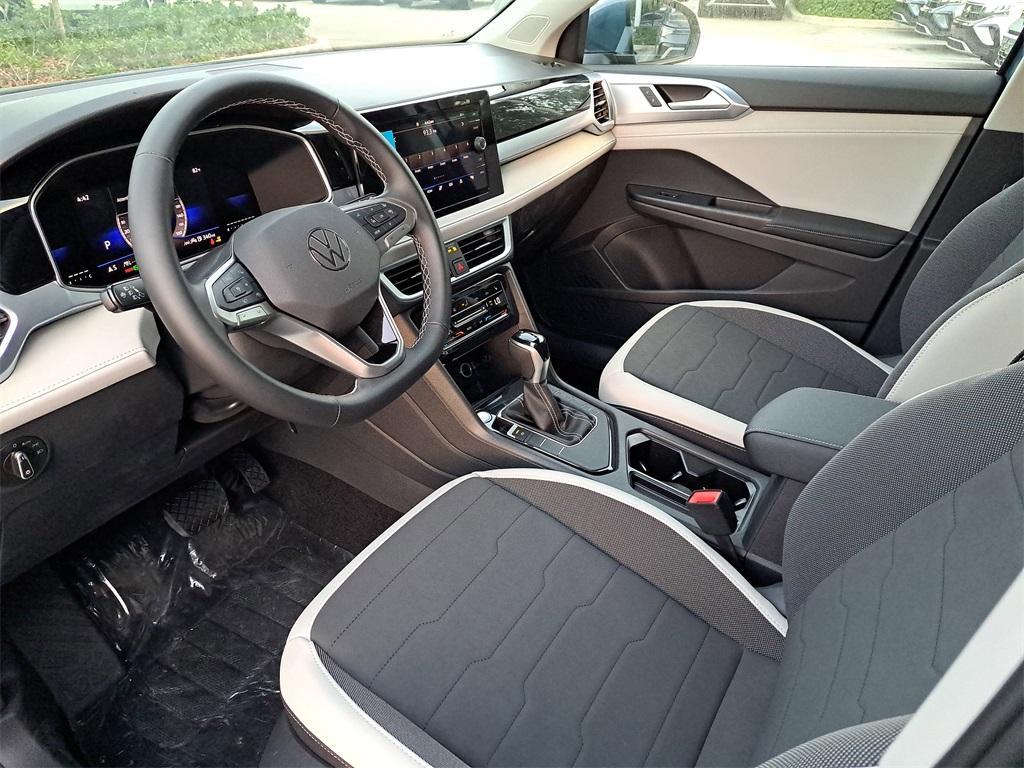 used 2025 Volkswagen Taos car, priced at $24,191