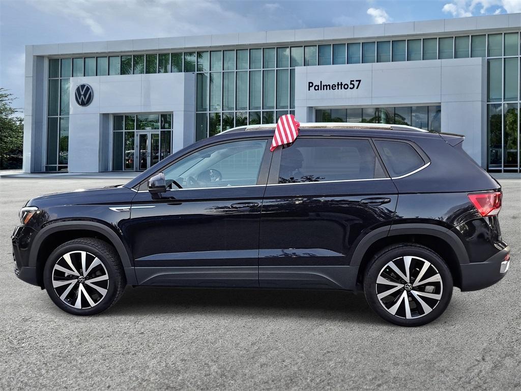 used 2023 Volkswagen Taos car, priced at $18,846