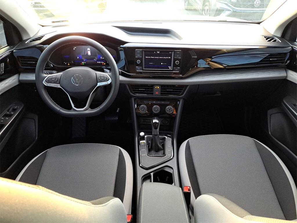 used 2024 Volkswagen Taos car, priced at $19,687