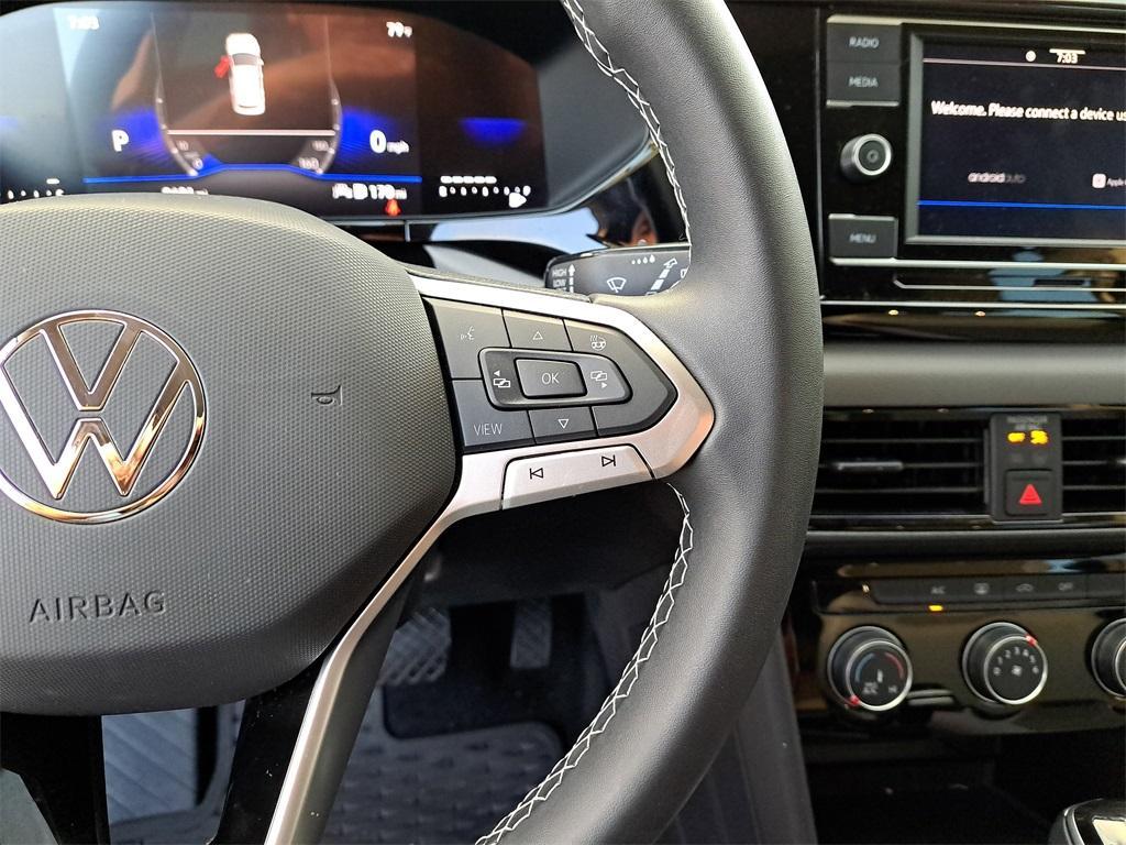 used 2024 Volkswagen Taos car, priced at $19,687