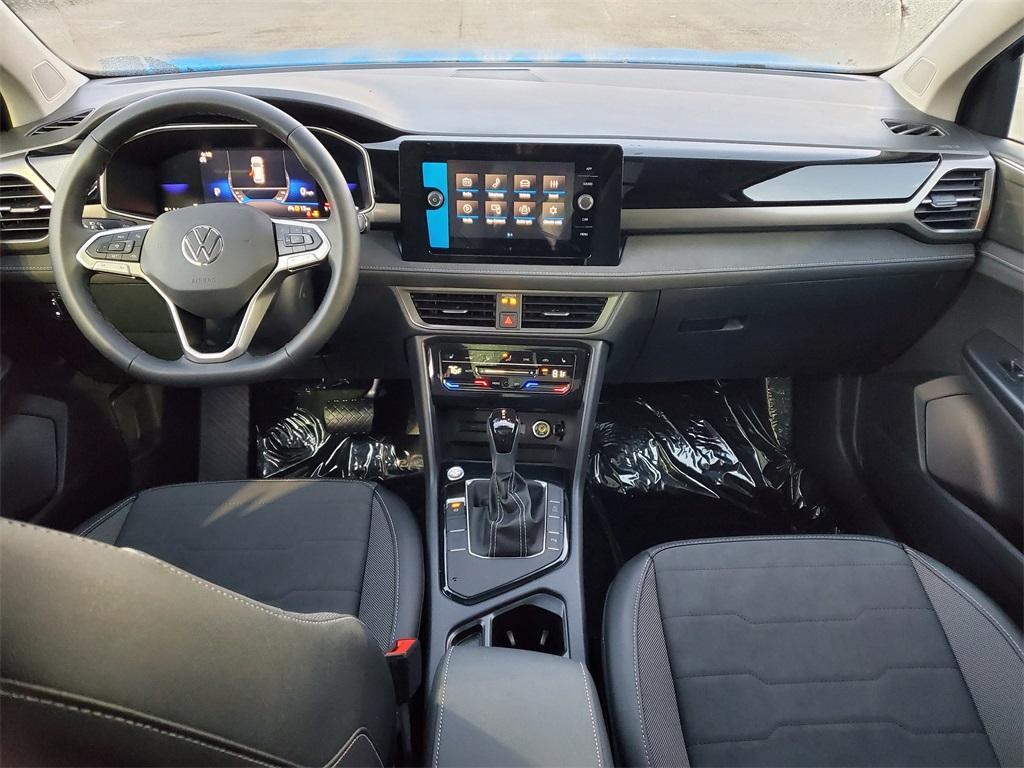 new 2025 Volkswagen Taos car, priced at $30,906