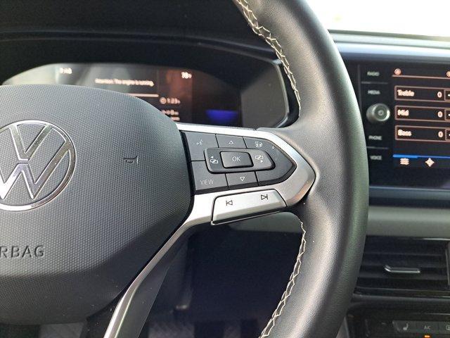 used 2023 Volkswagen Taos car, priced at $15,991