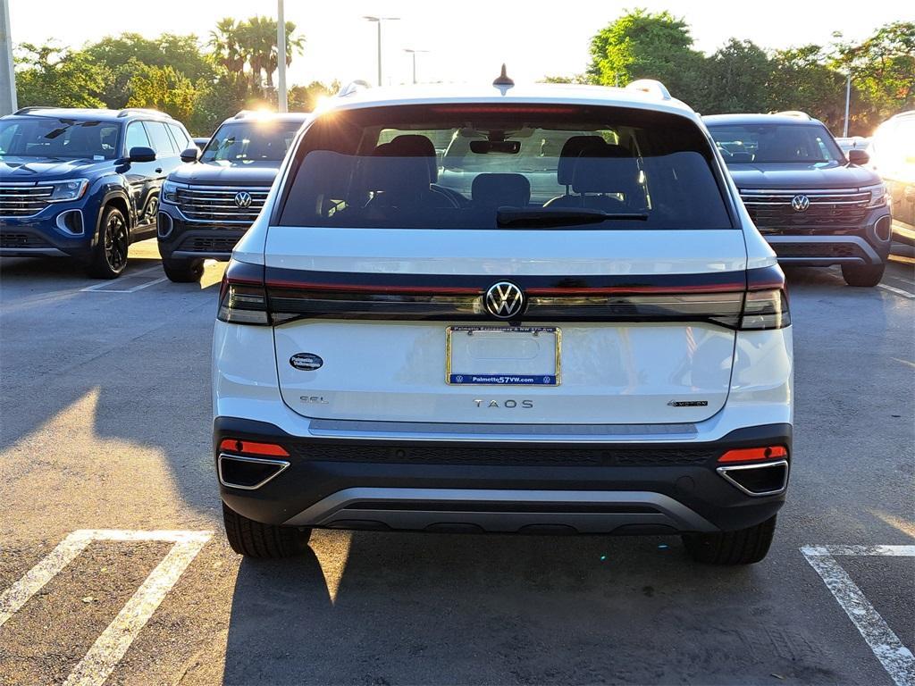 new 2025 Volkswagen Taos car, priced at $35,214