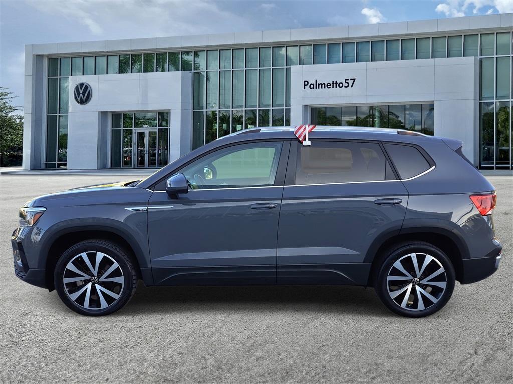 used 2023 Volkswagen Taos car, priced at $18,565