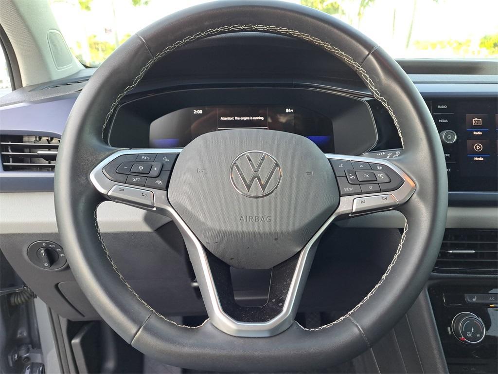 used 2023 Volkswagen Taos car, priced at $18,565