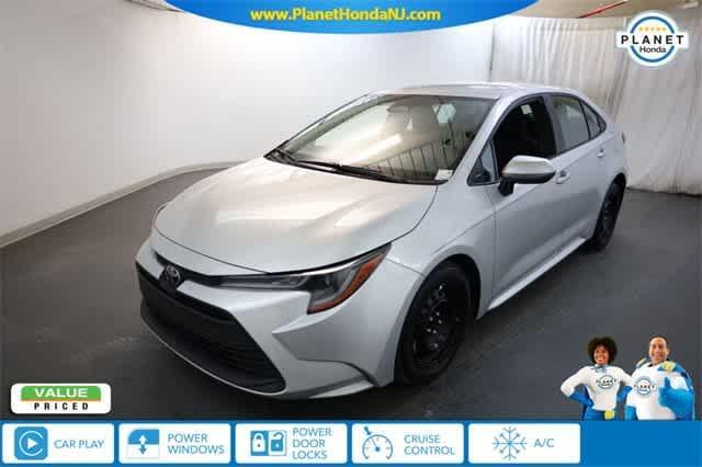 used 2023 Toyota Corolla car, priced at $16,894