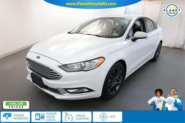 used 2018 Ford Fusion car, priced at $15,396