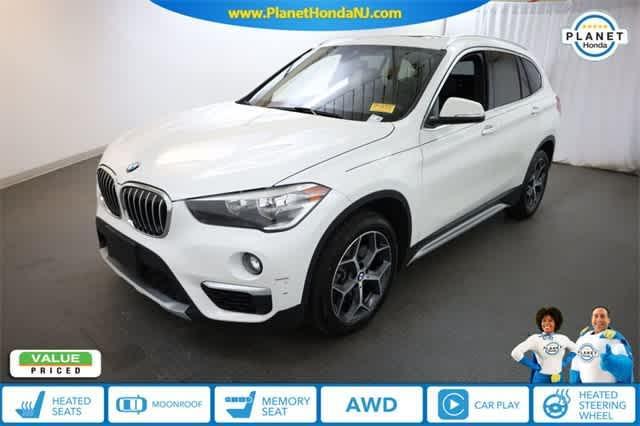 used 2019 BMW X1 car, priced at $19,999