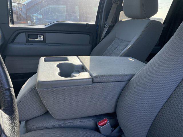 used 2014 Ford F-150 car, priced at $14,000