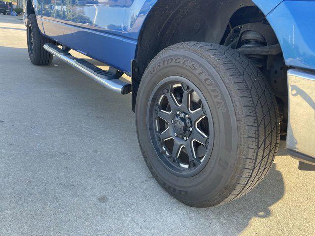 used 2014 Ford F-150 car, priced at $14,000