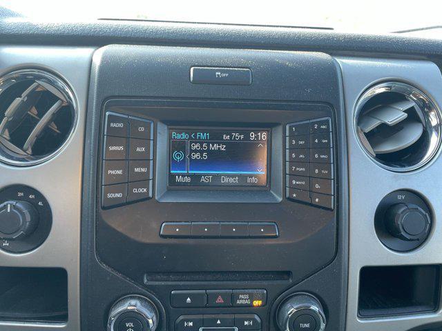 used 2014 Ford F-150 car, priced at $14,000