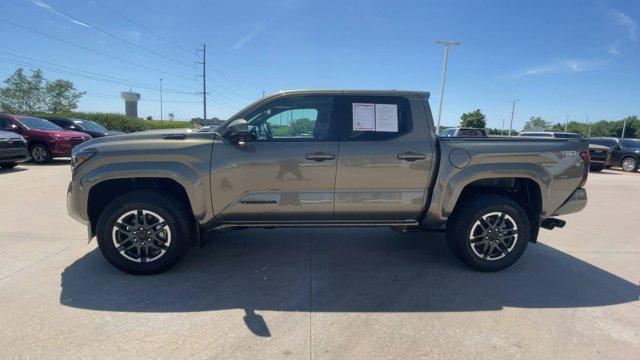 used 2024 Toyota Tacoma car, priced at $49,000