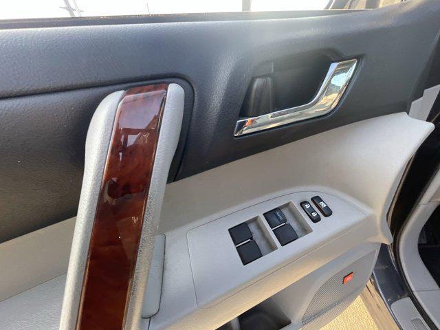 used 2012 Toyota Highlander car, priced at $14,000
