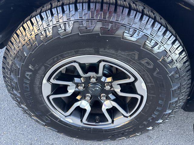 used 2018 Ram 1500 car, priced at $25,700