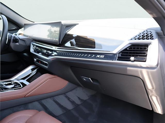 used 2024 BMW X6 car, priced at $76,990