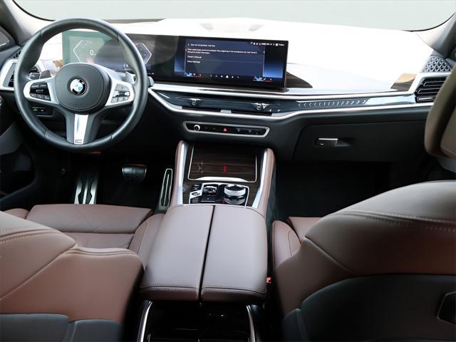 used 2024 BMW X6 car, priced at $76,990