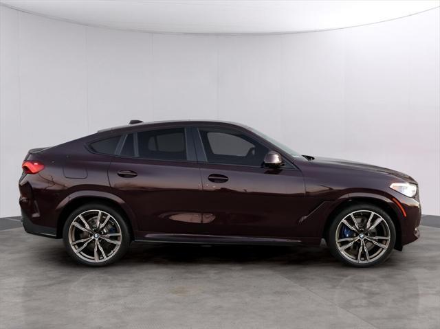 used 2022 BMW X6 car, priced at $65,990