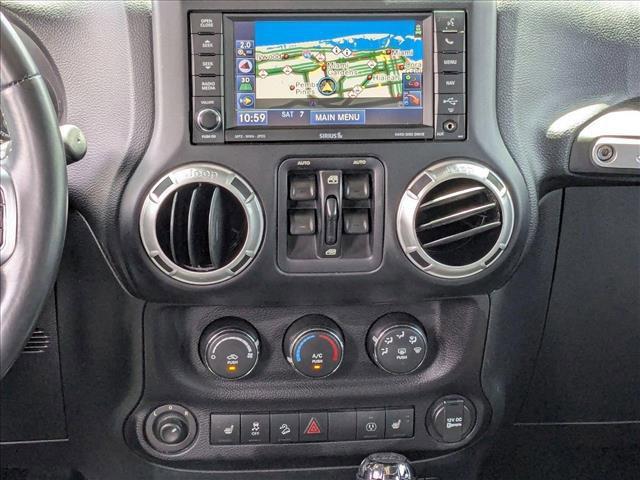 used 2015 Jeep Wrangler Unlimited car, priced at $18,994