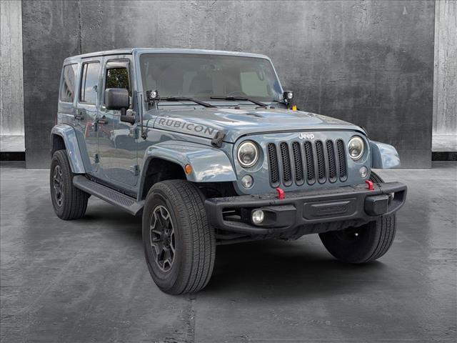 used 2015 Jeep Wrangler Unlimited car, priced at $20,551