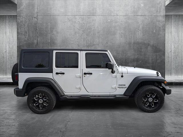 used 2014 Jeep Wrangler Unlimited car, priced at $14,714