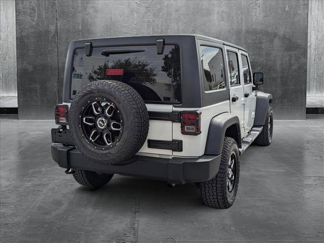 used 2014 Jeep Wrangler Unlimited car, priced at $14,714