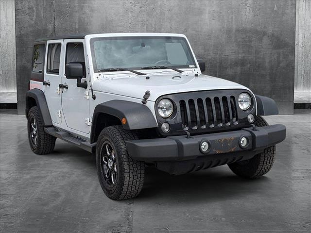 used 2014 Jeep Wrangler Unlimited car, priced at $14,714