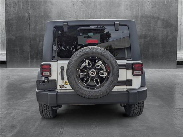 used 2014 Jeep Wrangler Unlimited car, priced at $14,714