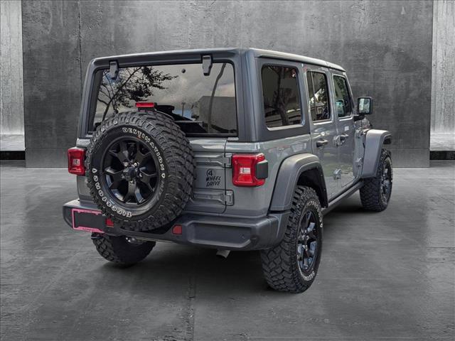 used 2021 Jeep Wrangler car, priced at $29,848