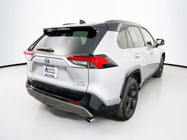 used 2019 Toyota RAV4 Hybrid car, priced at $23,876