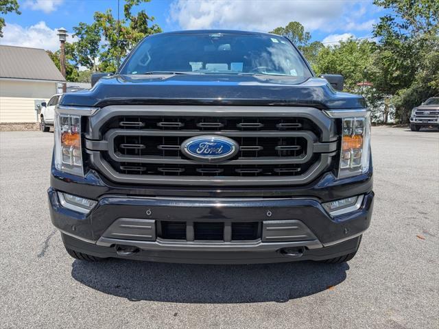 used 2022 Ford F-150 car, priced at $45,161