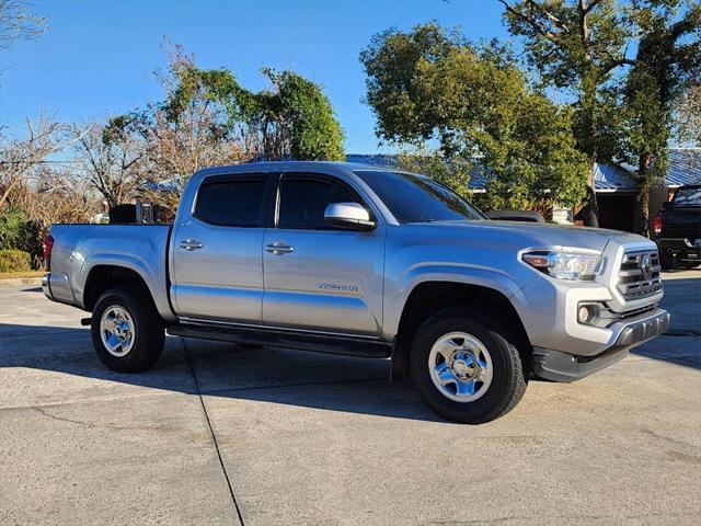 used 2019 Toyota Tacoma car, priced at $27,672