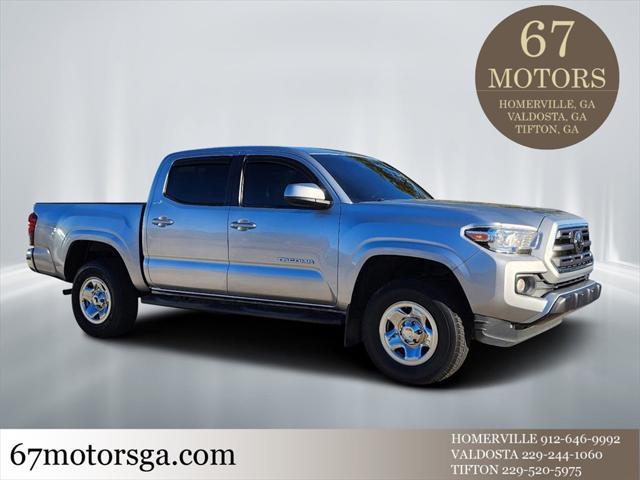 used 2019 Toyota Tacoma car, priced at $27,672