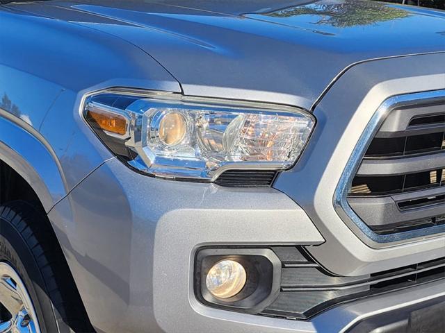 used 2019 Toyota Tacoma car, priced at $27,672