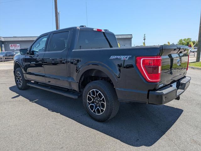 used 2023 Ford F-150 car, priced at $42,082