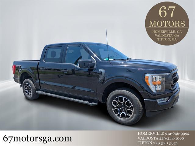 used 2023 Ford F-150 car, priced at $42,082