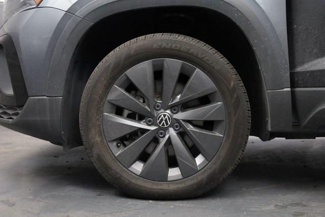 used 2023 Volkswagen Taos car, priced at $15,830
