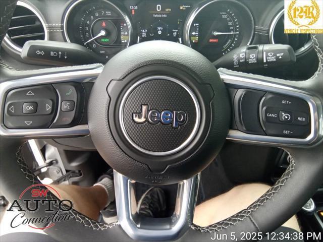used 2023 Jeep Wrangler 4xe car, priced at $29,975