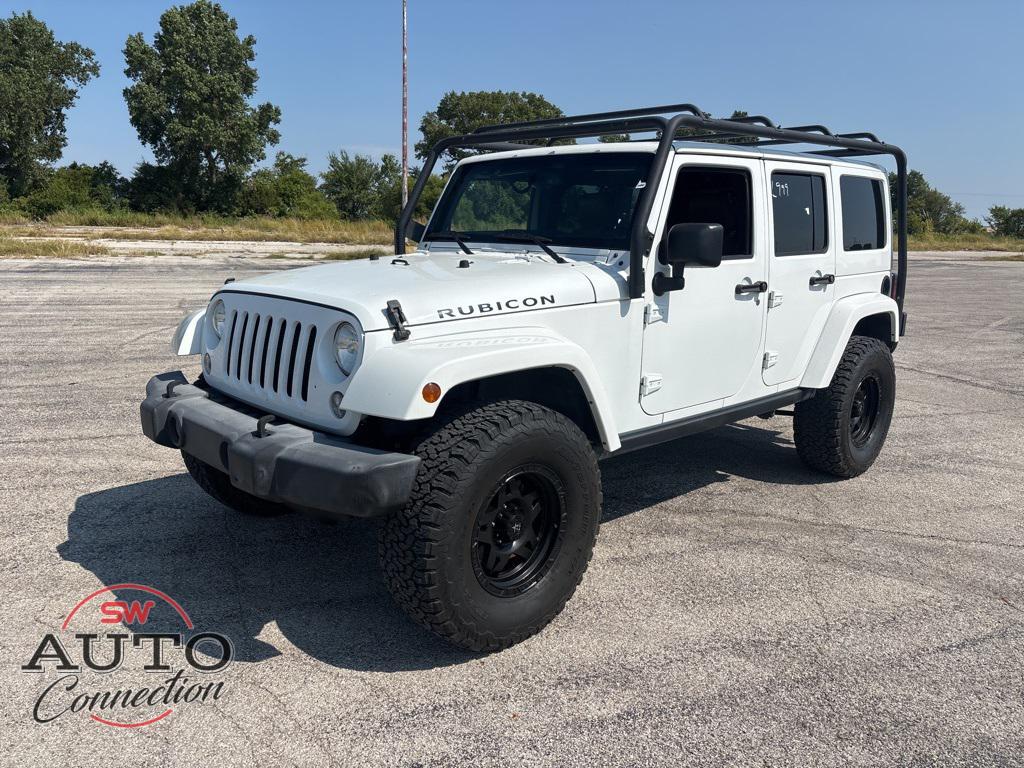 used 2015 Jeep Wrangler Unlimited car, priced at $19,745