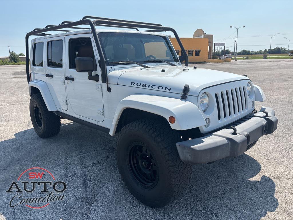 used 2015 Jeep Wrangler Unlimited car, priced at $19,745