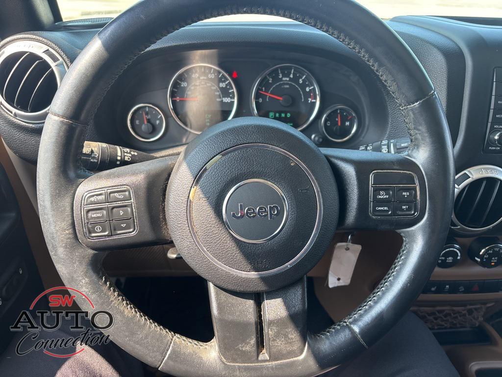 used 2015 Jeep Wrangler Unlimited car, priced at $19,745