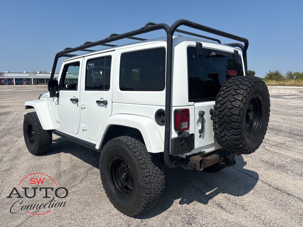 used 2015 Jeep Wrangler Unlimited car, priced at $19,745